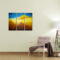 Abstract desert landscape triptych with layered golden dunes, warm earthy tones, and a blue sky