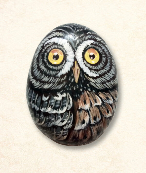 Artistic eagle paperweight called Hootie, painted by hand on a natural stone with realistic textures and bold colors