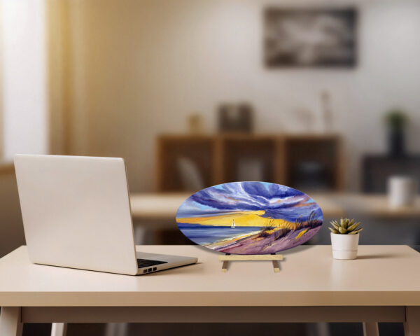 A warm sunset painting with a sailboat symbolizing closure, peace, and fulfillment